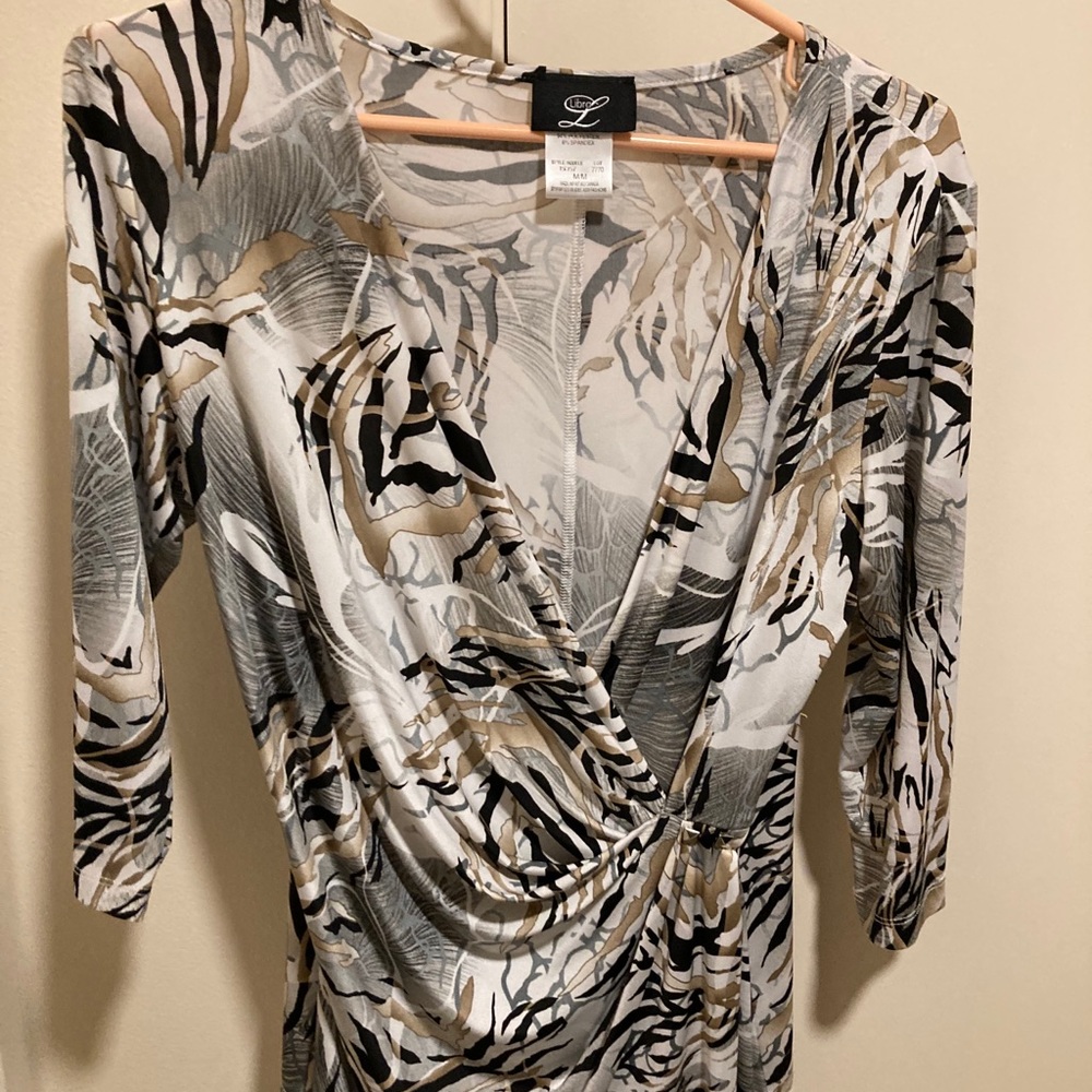 NEW never worn Soft tunic top. Polyester/Spandex